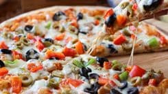 Ev Yapımı Pizza Tarifi: Lezzetli ve Pratik Bir Ev Ziyafeti